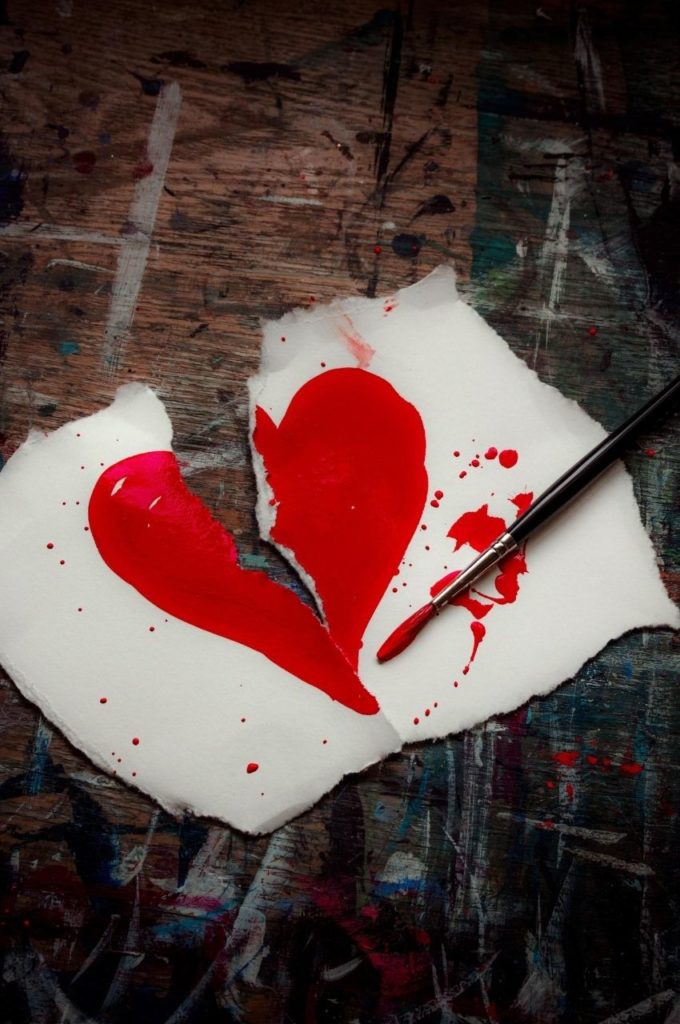 red heart painted on paper