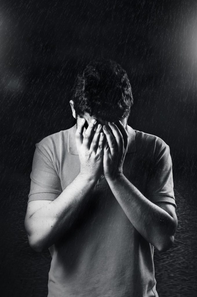 man crying rain
