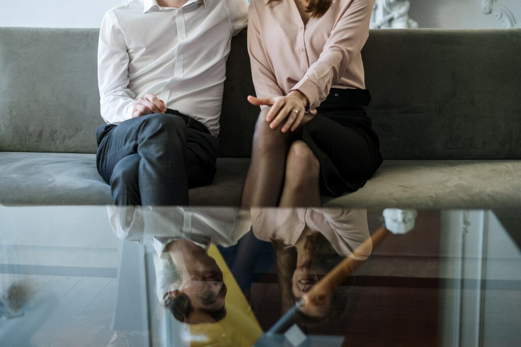 couple sitting on sofa